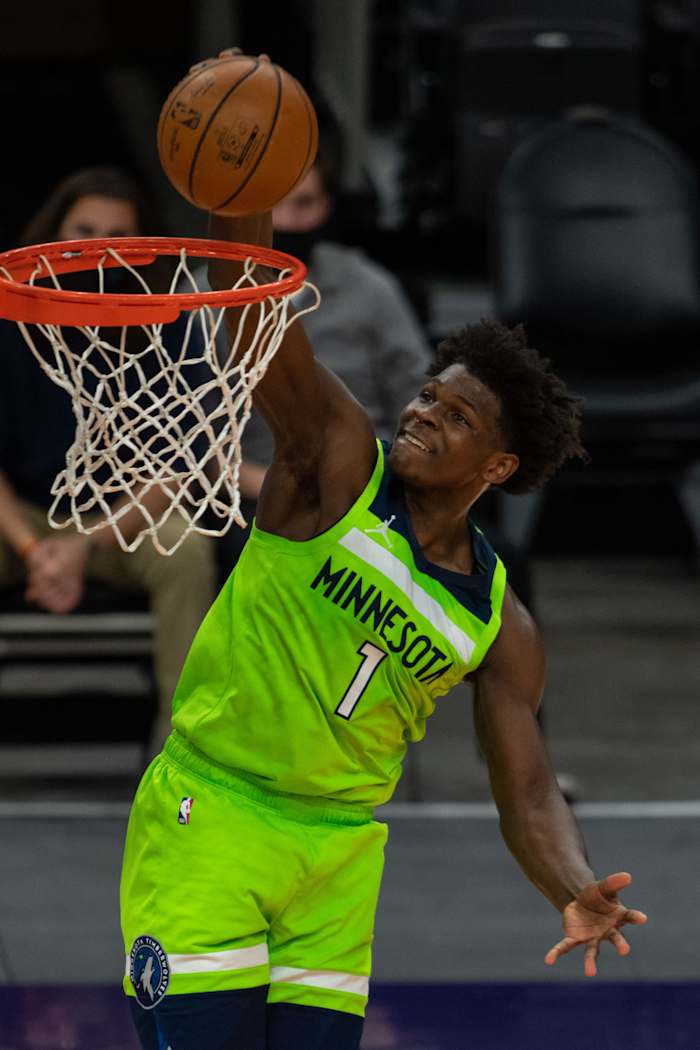 Mar 18, 2021; Phoenix, Arizona, USA; Minnesota Timberwolves forward Anthony Edwards (1) dunks the ball against the Phoenix Suns in the first half at Phoenix Suns Arena.
